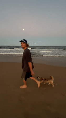 Heart drawn in sand washed away at Woonona Beach