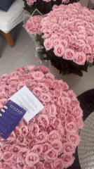 Pink rose bouquets and balloons displayed in North Kuta