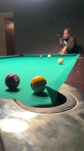 Evening billiards game captured in Odesa venue