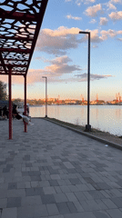 Evening life unfolds along Cherepovets waterfront and city streets