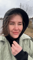 Woman enjoys snowfall, takes selfie in Perm region