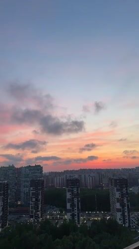 Evening skywatch captures sunset views across Kudrovo, Russia cityscape