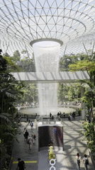 Early morning visitors document Rain Vortex at Jewel Changi Airport