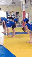 Youth martial arts training session documented in Chaikovsky gymnasium