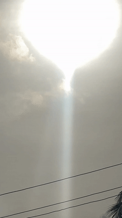 Morning sun breaks through clouds over Badagry, Nigeria