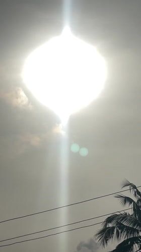 Morning sun breaks through clouds over Badagry, Nigeria