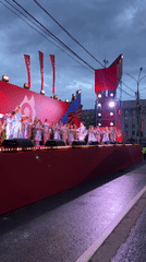 Young dancers perform on decorated outdoor stage in Novosibirsk