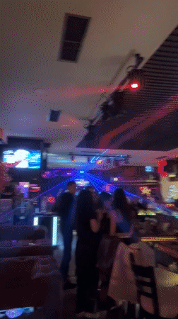 Blue-lit nightclub scene documented in Sofia, Bulgaria