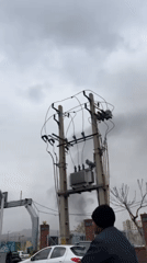 Black smoke plume observed over Tehran streets
