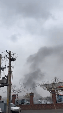 Black smoke plume observed over Tehran streets