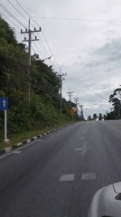 Driving through Ko Samui's checkered-curb roads