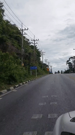 Driving through Ko Samui's checkered-curb roads