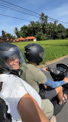 Two people spotted riding scooter in Abiansemal, Indonesia