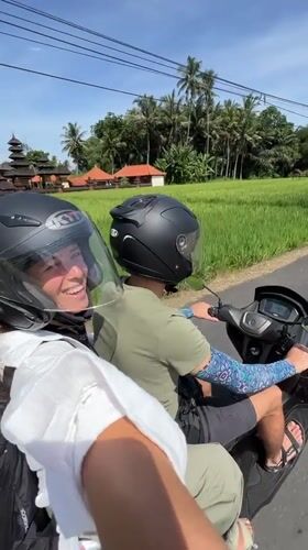 Two people spotted riding scooter in Abiansemal, Indonesia