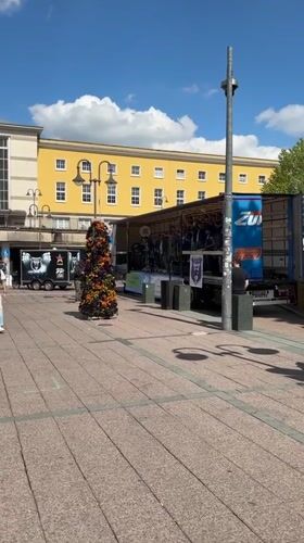 Street band performs on truck stage in Fulda