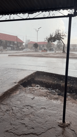 Heavy rain falls on roundabout in Rafin Par, Nigeria
