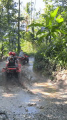 Late-night ATV tour group travels through rural Payangan villages