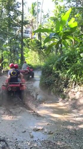 Late-night ATV tour group travels through rural Payangan villages