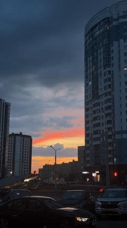 Colorful sunset observed over Minsk streets during evening hours