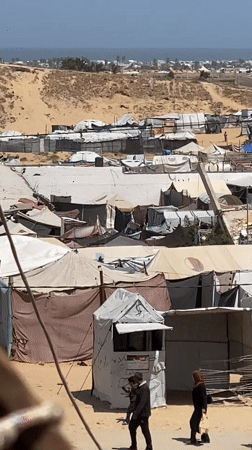 Khan Yunis scenes show damaged buildings, displacement camp, daily life