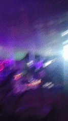 A lively evening at a dimly lit club or bar
