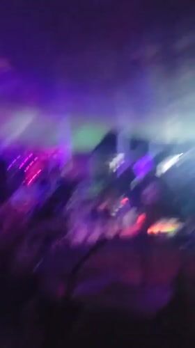 A lively evening at a dimly lit club or bar