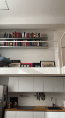 Modern minimalist apartment interior documented in Milan
