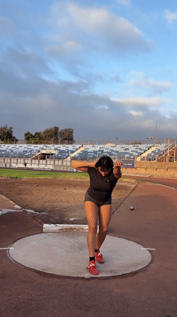 Shot put action at Estadio Carlos Dittborn, Arica