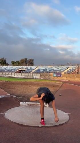 Shot put action at Estadio Carlos Dittborn, Arica