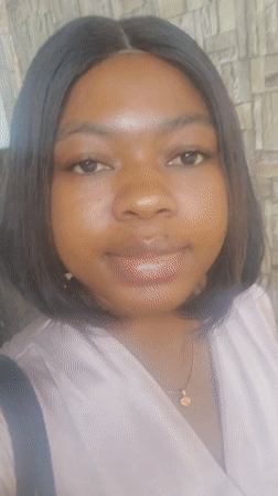 Woman in pink top spotted indoors, outdoors in Gwagwada