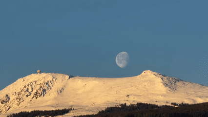 Full moon over snow-covered mountains observed in Sofia