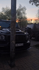Two Mercedes G-Wagons parked during sunset in Sofia