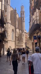 Tourist documents afternoon walking tour through central Barcelona districts