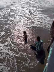 Beach day at Keude Trienggadeng with kids in the surf