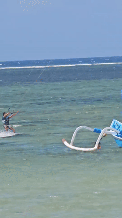 Kitesurfing action at Sanur beach, Bali