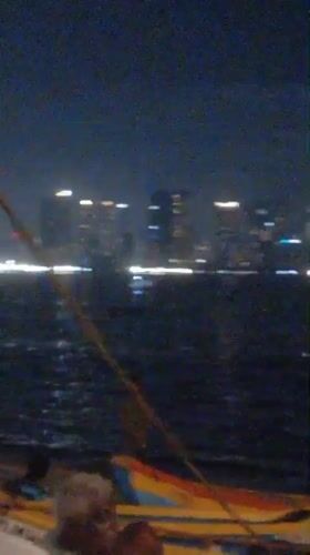 Evening waterfront activity documented near Mumbai's Bandra-Worli Sea Link