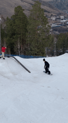 Snowboarders practice rail tricks on Krasnoyarsk slopes