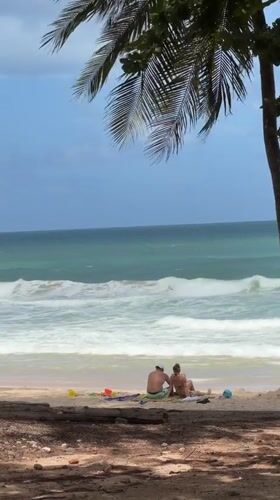 Couple enjoys early morning beach moment in Choeng Thale