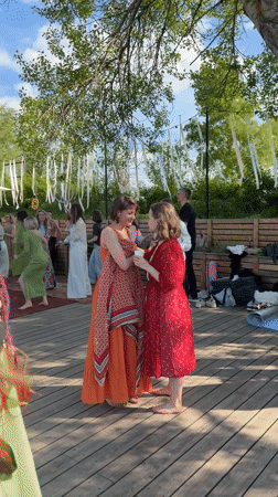 Waterside dance gathering draws dozens to Khimki deck celebration