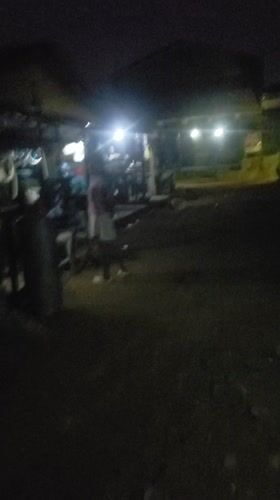 Evening street life documented in Alalubosa, Ibadan neighborhoods