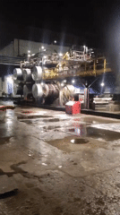 Industrial facility documented at night in Pavlodar, Kazakhstan