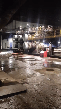 Industrial facility documented at night in Pavlodar, Kazakhstan