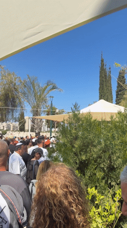 Large crowd gathers in Petah Tikva under sunny skies