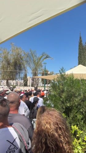 Large crowd gathers in Petah Tikva under sunny skies