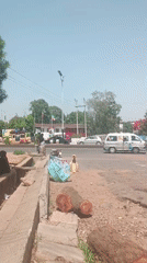 Street vendors and residents gather in Jos neighborhood