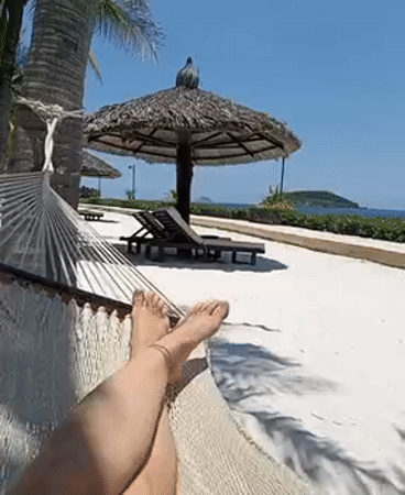 Morning beach relaxation captured at Vietnam heritage area