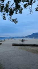 Early morning scenes documented across Vancouver beaches and streets