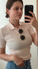 Woman takes mirror selfies in Belgrade apartment