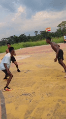 Pickup basketball on a weathered outdoor court in Egbagu, Nigeria