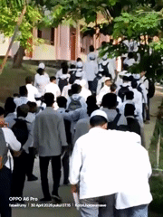 Students march in formation through Lhokseumawe, Indonesia